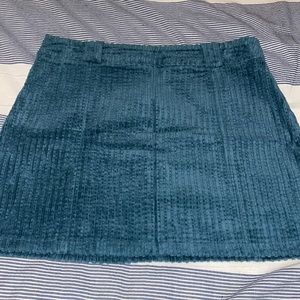 Super cute skirt!  Teal color size Medium in EXCELLENT condition!